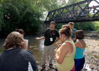 A Graduate Student from SUNY-ESF Prepares Students to Explore the Habitat along Onondaga Creek